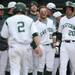 Eastern Michigan senior Tucker Rubino shouts as he waits with his teammates to celebrate a run by senior Bo Kinder in the fourth inning against Michigan at Eastern on Wednesday.  Melanie Maxwell I AnnArbor.com